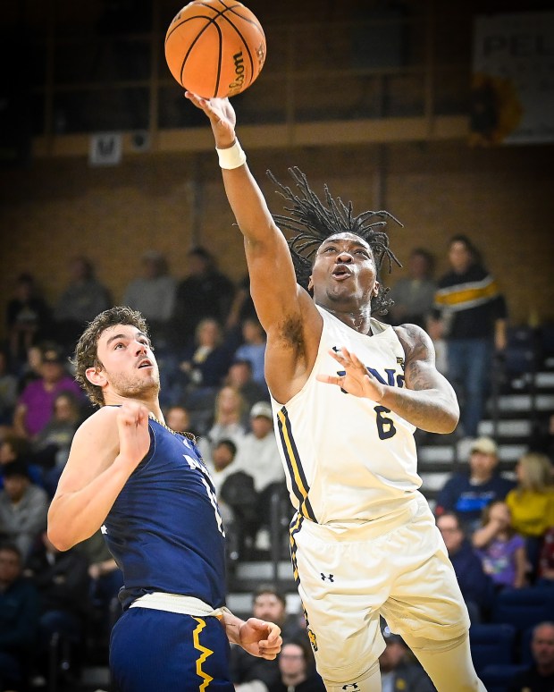 University of Northern Colorado junior Langston Reynolds slides to the basket to score while playing Northern Arizona at Bank of Colorado Arena on Saturday Feb. 1, 2025. The Bears won 87-69 to remain first in the Big Sky Conference.(Jim Rydbom/Staff Photographer)
