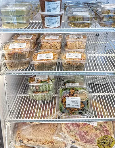 Prepared foods at the Roots Farm Market - SUZANNE PODHAIZER
