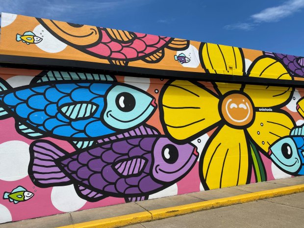 Artist Troy Summerell of OnieTonie Designs painted this mural on the 7-Eleven at the corner of 17th Street and Pacific Ave. Summerell's signature style of vibrant cartoonish sea creatures can be seen all over Virginia Beach. The artist is sharing a free digital download of his 19-page coloring book. Go to onietonie.com for the free download. Lee Belote/freelance