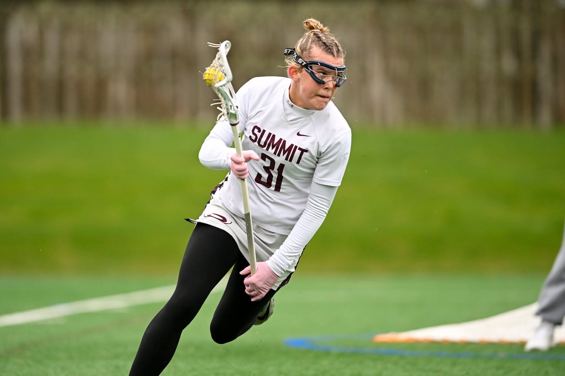 Emily Sensenich (31) of Summit plays against Oak Knoll during the girls lacrosse game between Oak Knoll and Summit at Oak Knoll High School in Chatham, NJ on Saturday, April 12, 2025.