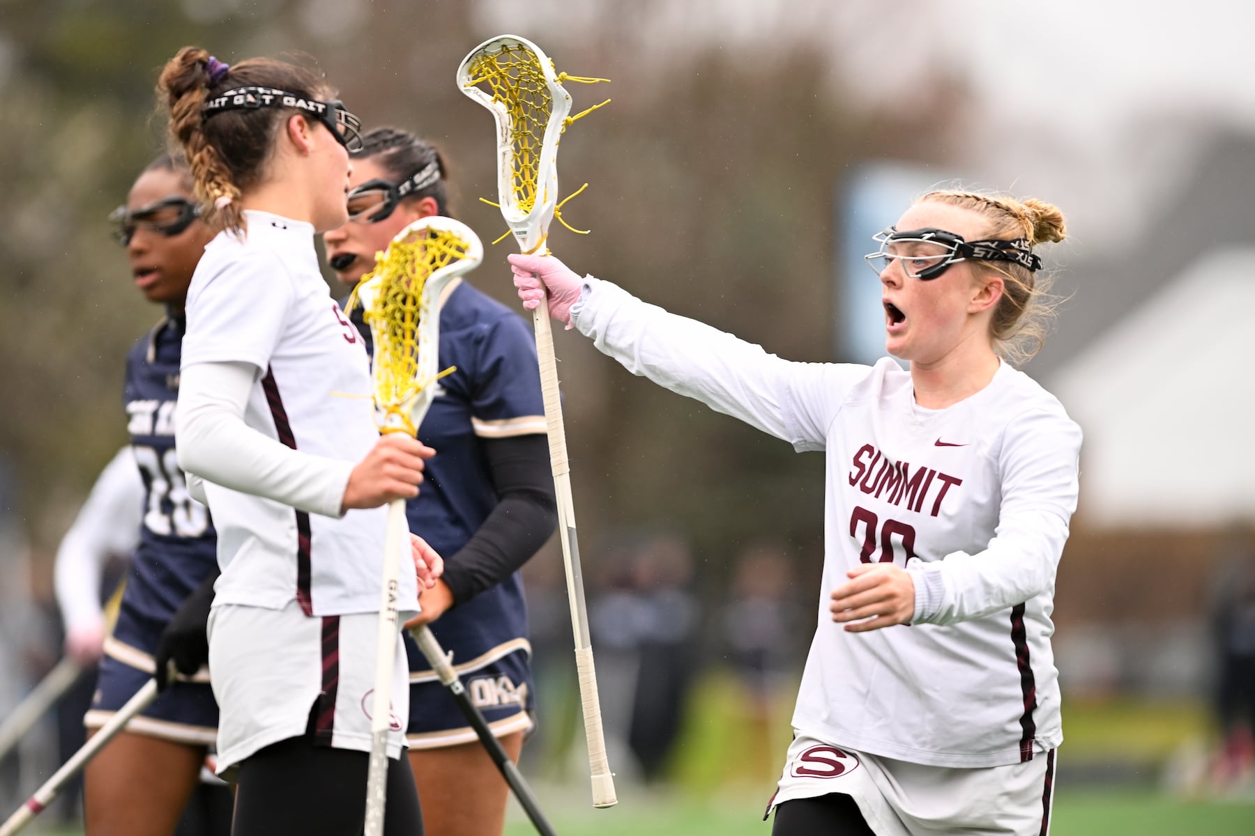 Anna Sheiman (29) of Summit celebrates with Parker Febo (7) of Summit after her goal during the girls lacrosse game between Oak Knoll and Summit at Oak Knoll High School in Chatham, NJ on Saturday, April 12, 2025.