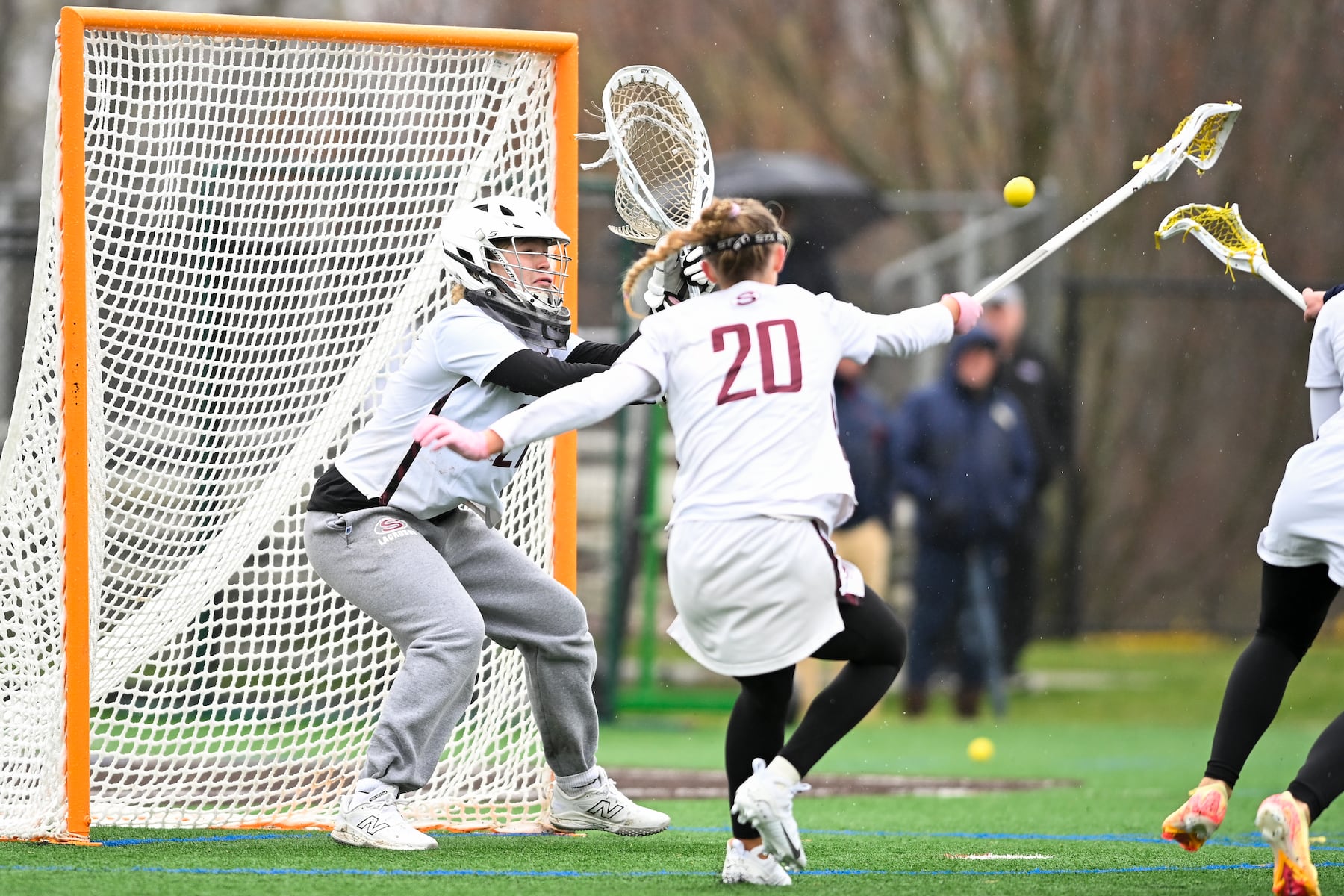 Melissa Dardanello (27) of Oak Knoll defends the goal during the girls lacrosse game between Oak Knoll and Summit at Oak Knoll High School in Chatham, NJ on Saturday, April 12, 2025.