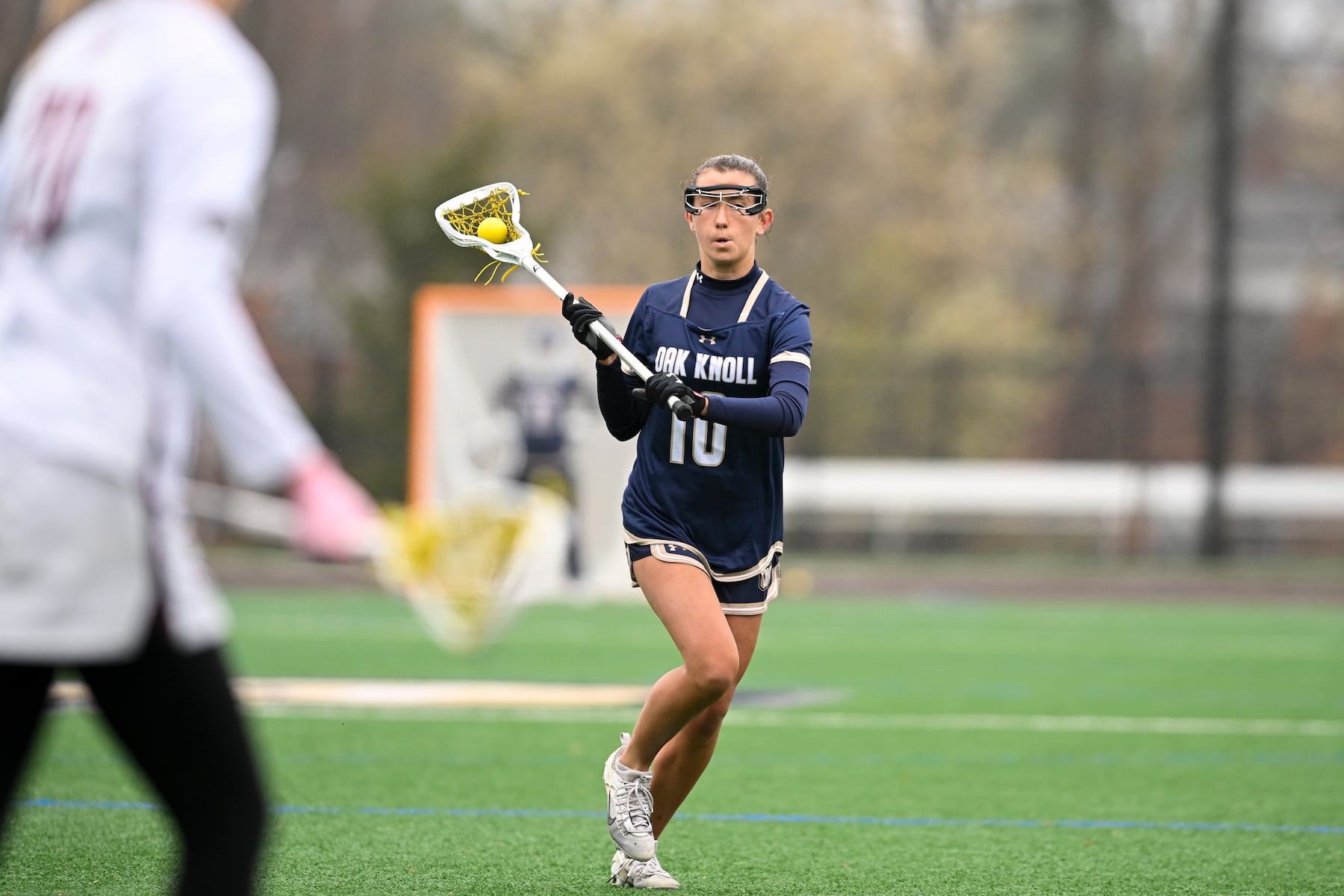 Lila Anderson (10) of Oak Knoll plays against Summit during the girls lacrosse game between Oak Knoll and Summit at Oak Knoll High School in Chatham, NJ on Saturday, April 12, 2025.