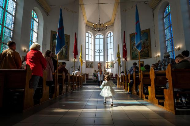 Ukrainian Roman Catholic believers celebrate Easter in a cathedral in...