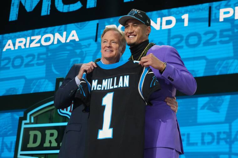 KIRBY LEE / IMAGN IMAGES
NFL commissioner Roger Goodell posed with Arizona Wildcats wide receiver Tetairoa McMillan after the Waimanalo-born wide receiver was chosen eighth overall by the Carolina Panthers in the NFL Draft at Lambeau Field today.