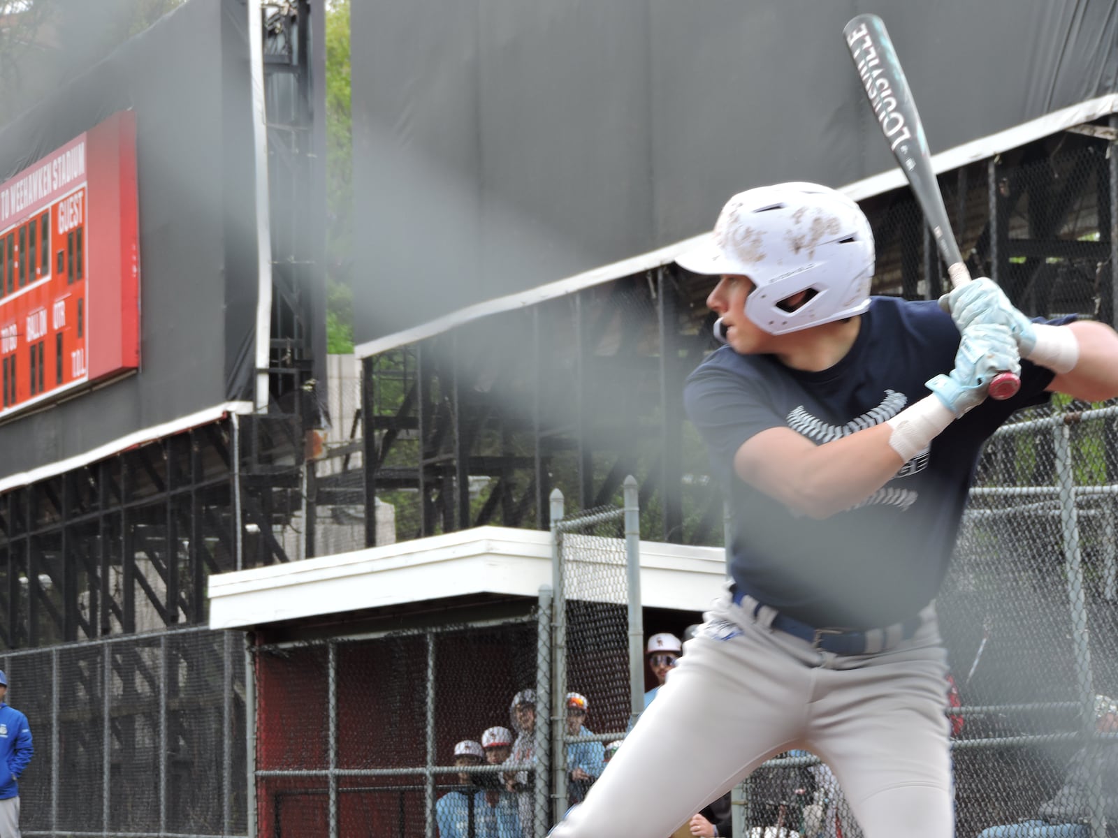 A ray of sunshine pokes through as Passaic Tech's Matt Caruso gets ready to swing