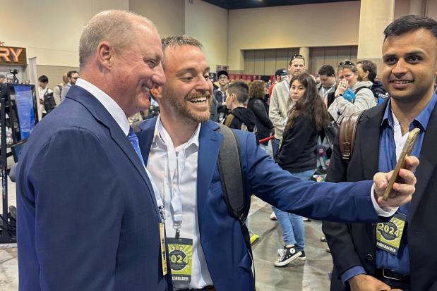 Berkshire Hathaway shareholders line up to take selfies with Greg Abel