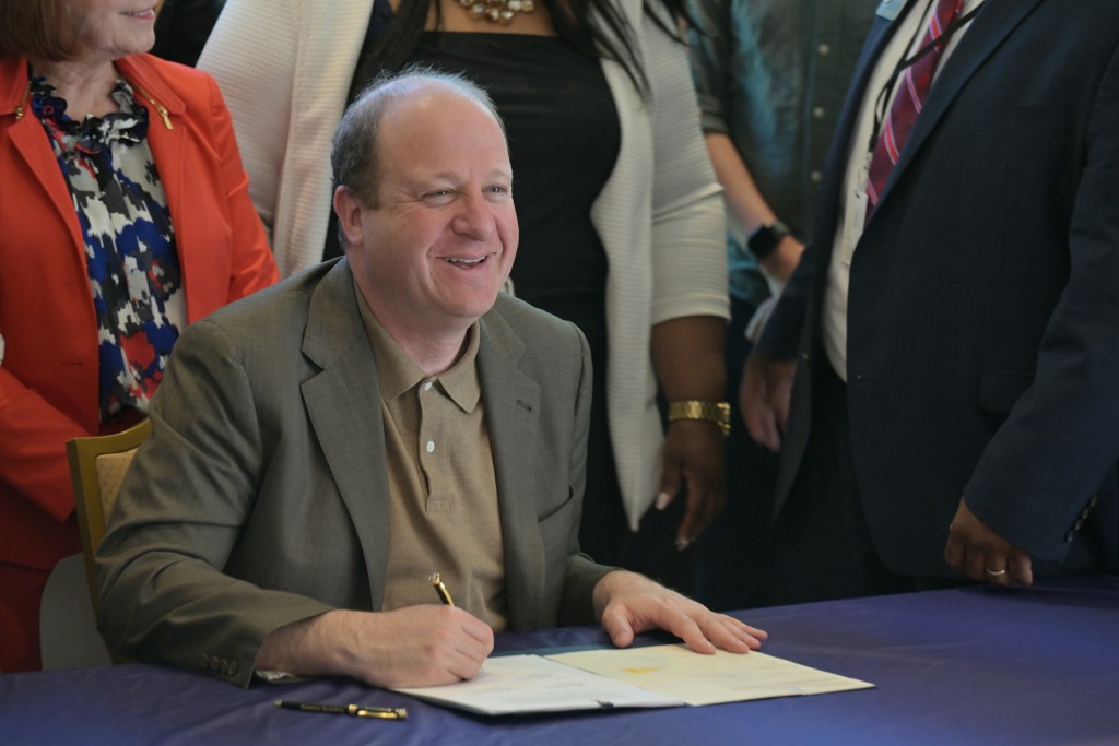 Gov. Jared Polis signs voting protections, vacancy election reform law