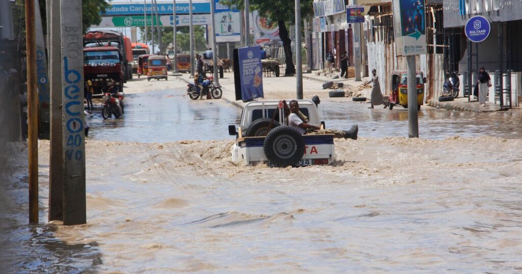 At least seven people die as heavy rains leave waist-high floodwaters in Somalia’s capital