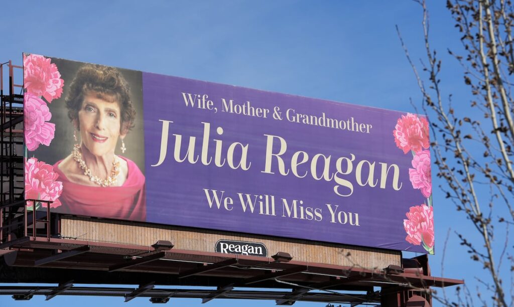 One of Julia Reagan's billboards made an appearance during Trixie Mattel's show