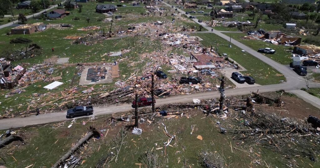 PHOTO GALLERY: Storm systems sweep across parts of the U.S. Midwest and South killing at least 23