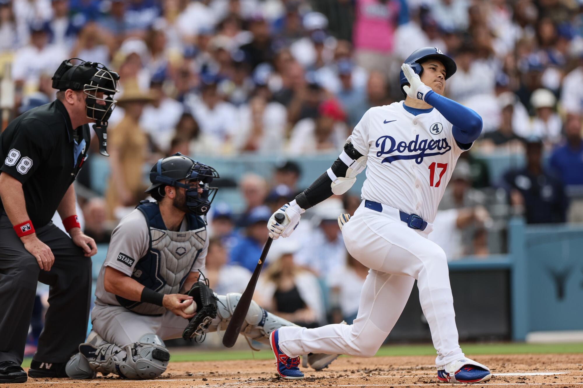 Dodgers star Shohei Ohtani strikes out against the Yankees in the first inning Sunday.