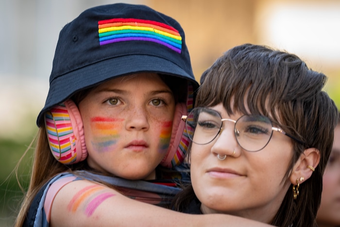 (Rick Egan | The Salt Lake Tribune) Emma & Sierra Hunsaker watch the Pride Parade, on Sunday, June 8, 2025.