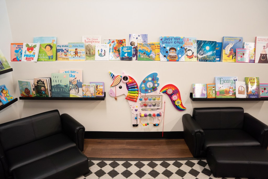 The children’s area in Daughters Coffee & Books. Nicole Grinnell, the owner, says she felt inspired to name the store Daughters because of her relationship with her mom and sister, who each have daughters of their own like she does. Photo by Angelica Edwards.