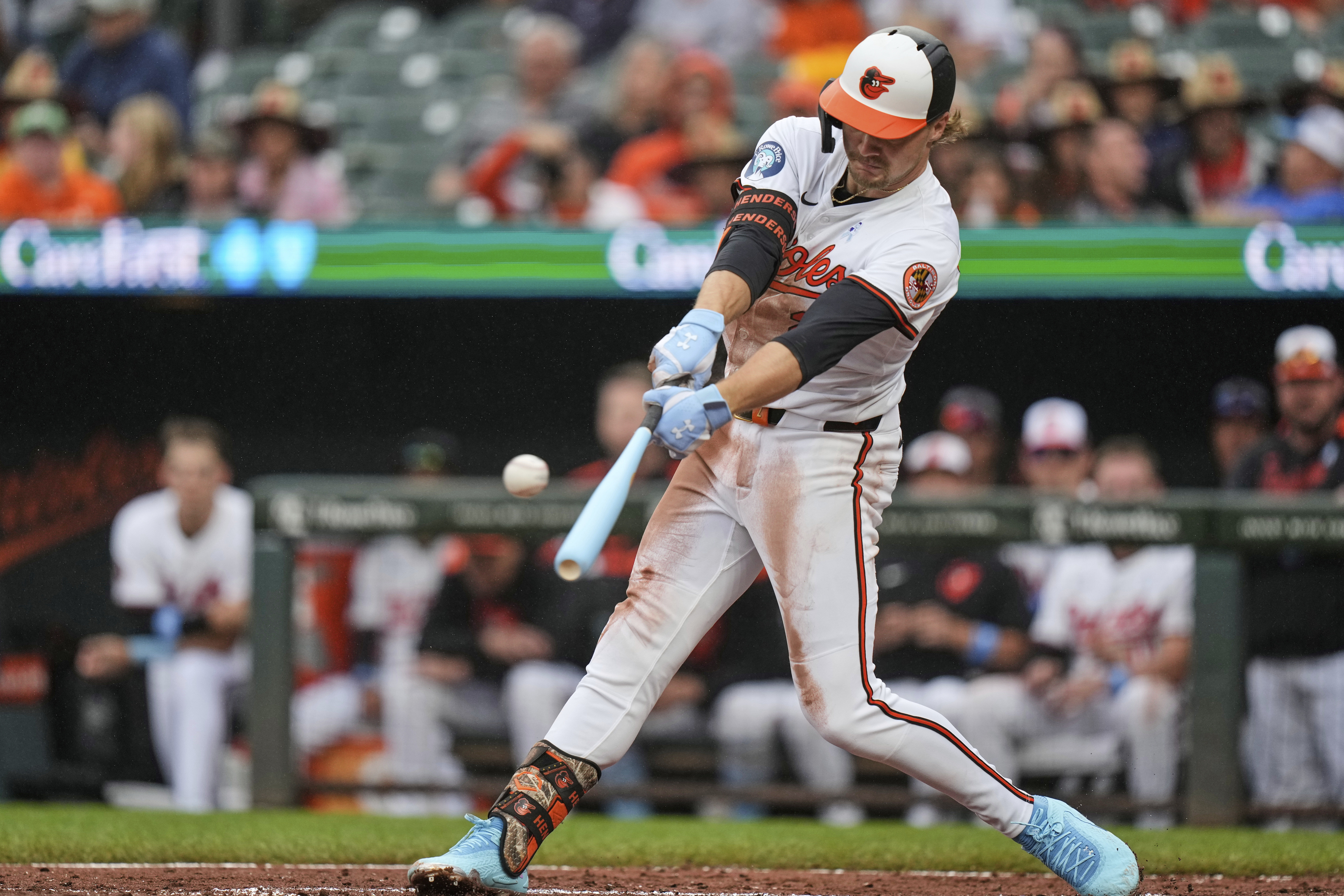 Baltimore Orioles' Gunnar Henderson hits a double during the fourth...