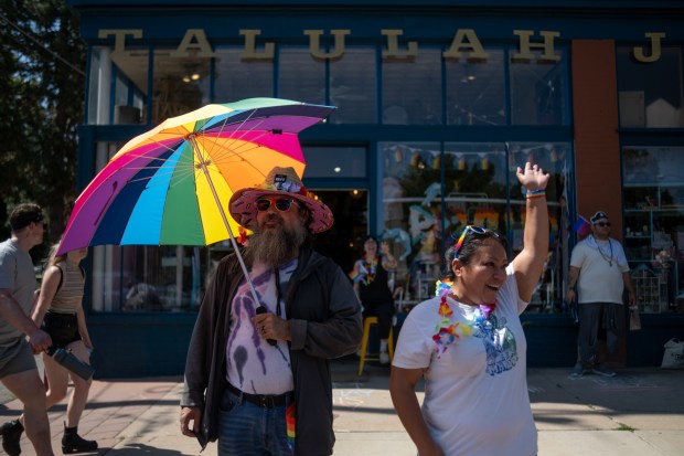 José and Marta Villegas enjoy the Denver Pride Parade down...