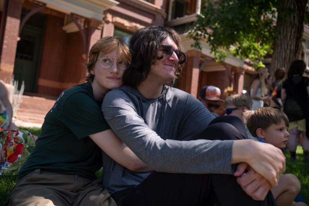 Silas, left, and Maddox enjoy the Denver Pride Parade together...