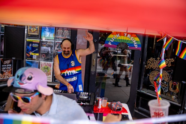 DJ Josh O mixes a set and dances with passersby...
