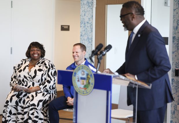 Angela Hurlock, left, interim CEO of the Chicago Housing Authority, and Mayor Brandon Johnson at a ribbon-cutting event for the Edith Spurlock Sampson Apartments in Lincoln Park on Feb. 27, 2025. (Eileen T. Meslar/Chicago Tribune)