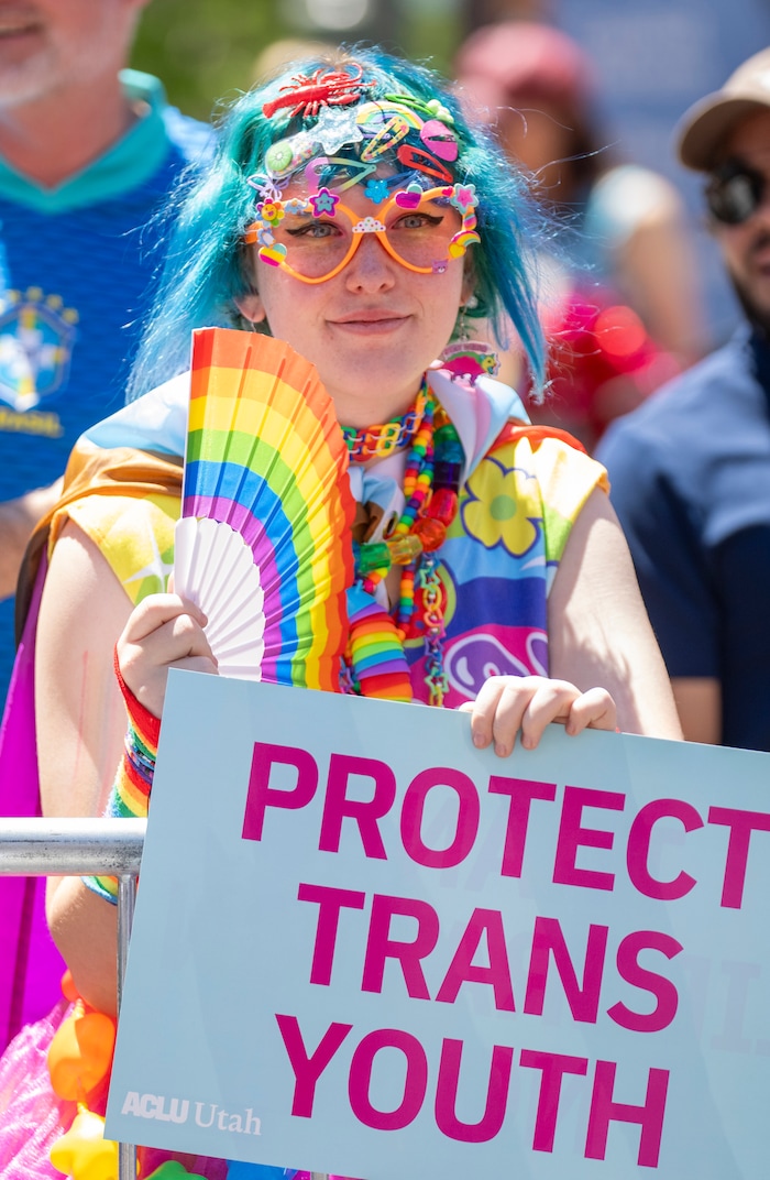 (Rick Egan | The Salt Lake Tribune) Neptune Nichols enjoys the Pride Parade, on Sunday, June 8, 2025.