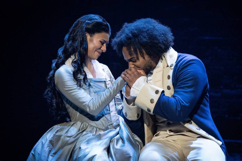 Lauren Mariasoosay and Tyler Fauntleroy are shown in the "Hamilton" national tour. (Joan Marcus)