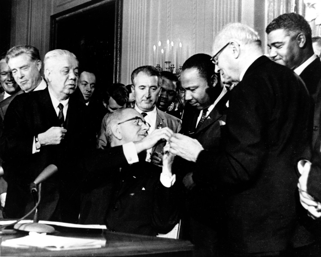 July 2, Civil Rights Act signed into law