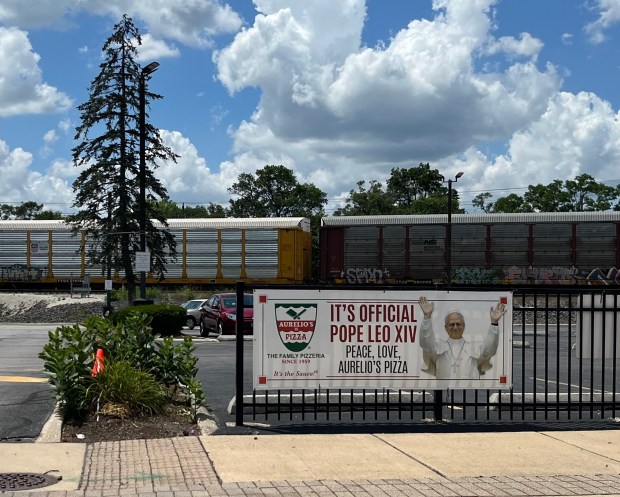Aurelio's Pizza in Homewood advertises its connection to Pope Leo XIV with a sign along its Harwood Avenue entrance. (Brett Johnson/Daily Southtown)
