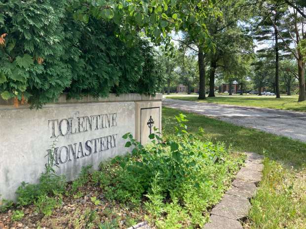A sign at the entrance of the former St. Nicholas of Tolentine Monastery along Governors Highway, which later became All Nations Assembly church, is pictured July 9, 2025. (Paul Eisenberg/Daily Southtown)