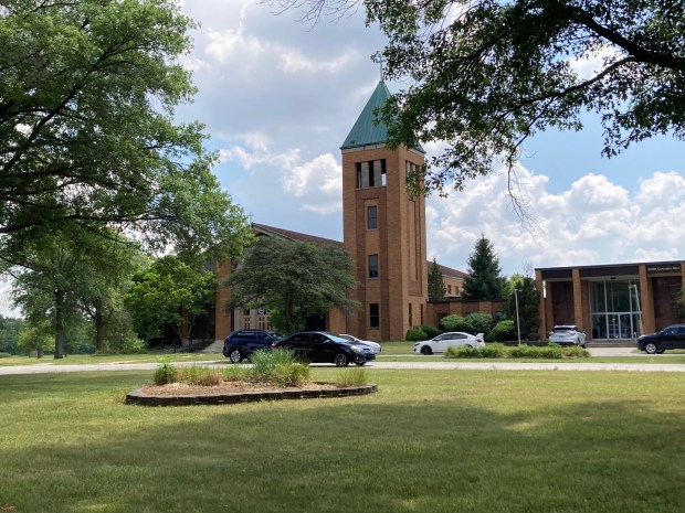 Cars are parked July 9, 2025, at the former St. Nicholas of Tolentine Monastery along Governors Highway, which later became All Nations Assembly church. (Paul Eisenberg/Daily Southtown)