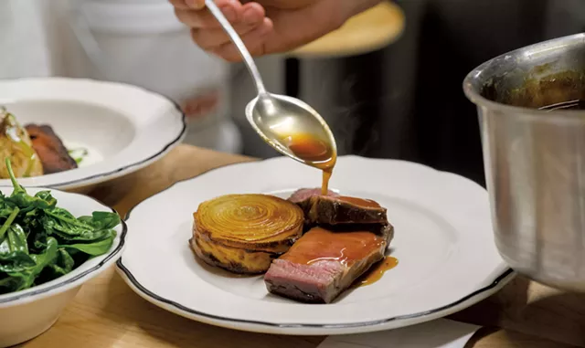 A chef plating a dish at Espace Old Mill - COURTESY OF DAPHNÉ CARON