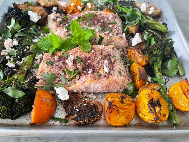 Sheet Pan Sumac-Dusted Salmon with Broccolini also features grilled oranges, feta cheese and tender herbs. (Photo by Cathy Thomas)
