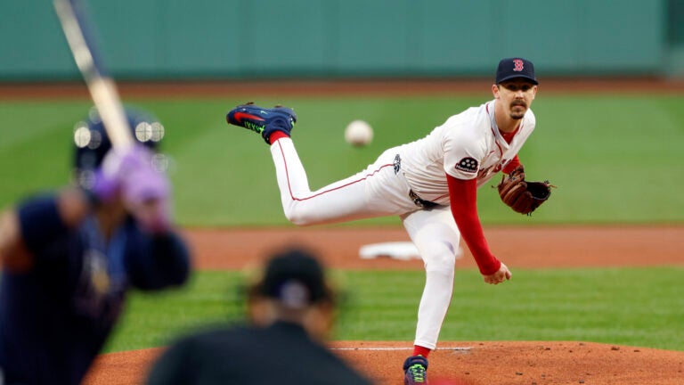 Boston Red Sox starting pitcher Walker Buehler (0) pitches to the Tampa Bay Rays during the first inning at Fenway Park on July 10, 2025.