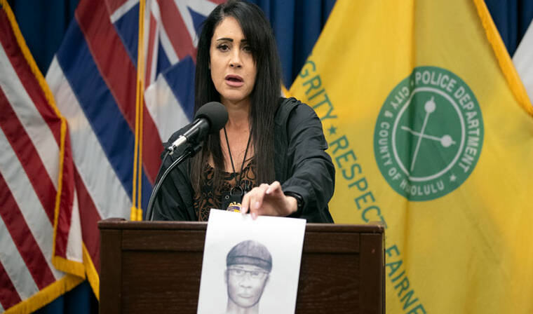 GEORGE F. LEE / GLEE@STARADVERTISER.COM
Homicide Lt. Deena Thoemmes held a news conference today at police headquarters offering surveillance images of a suspect crossing the street as well as a sketch of the suspect.