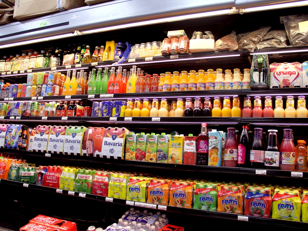 A shelf of drinks at Global Suq. Photo by Lena Geller. 