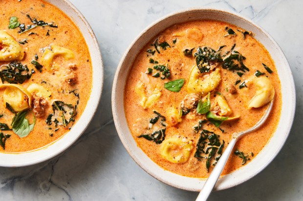 Creamy tortellini soup. Store-bought, cheese-filled tortellini are immersed in an extra creamy tomato broth alongside Italian sausage and Tuscan (lacinato) kale, creating a hearty and comforting soup that comes together in 30 minutes. Food styled by Simon Andrews. (Christopher Testani, The New York Times)