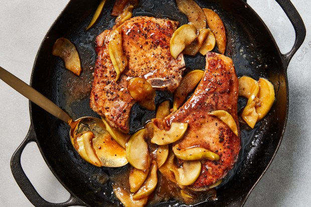 Skillet pork chops and apples with miso caramel. This recipe is like a delicious game of free association: miso caramel, caramel apples, apples and pork chops. Food styled by Barrett Washburne. (Christopher Testani, The New York Times)