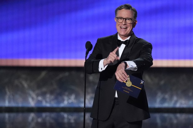 Stephen Colbert presents the award for outstanding lead actor in...
