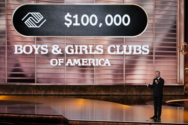 Host Nate Bargatze pleges a donation during the 77th Primetime...
