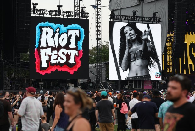 An image of Rico Nasty is cast on the big...
