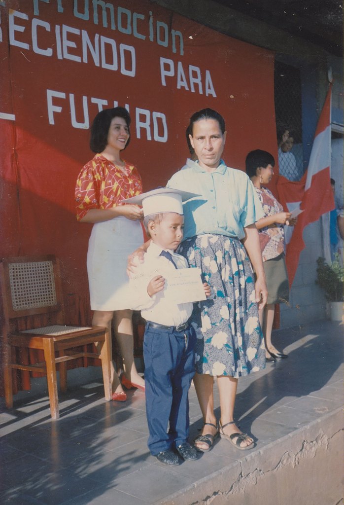 Chavarria and his mother at his kindergarten graduation in 1994
