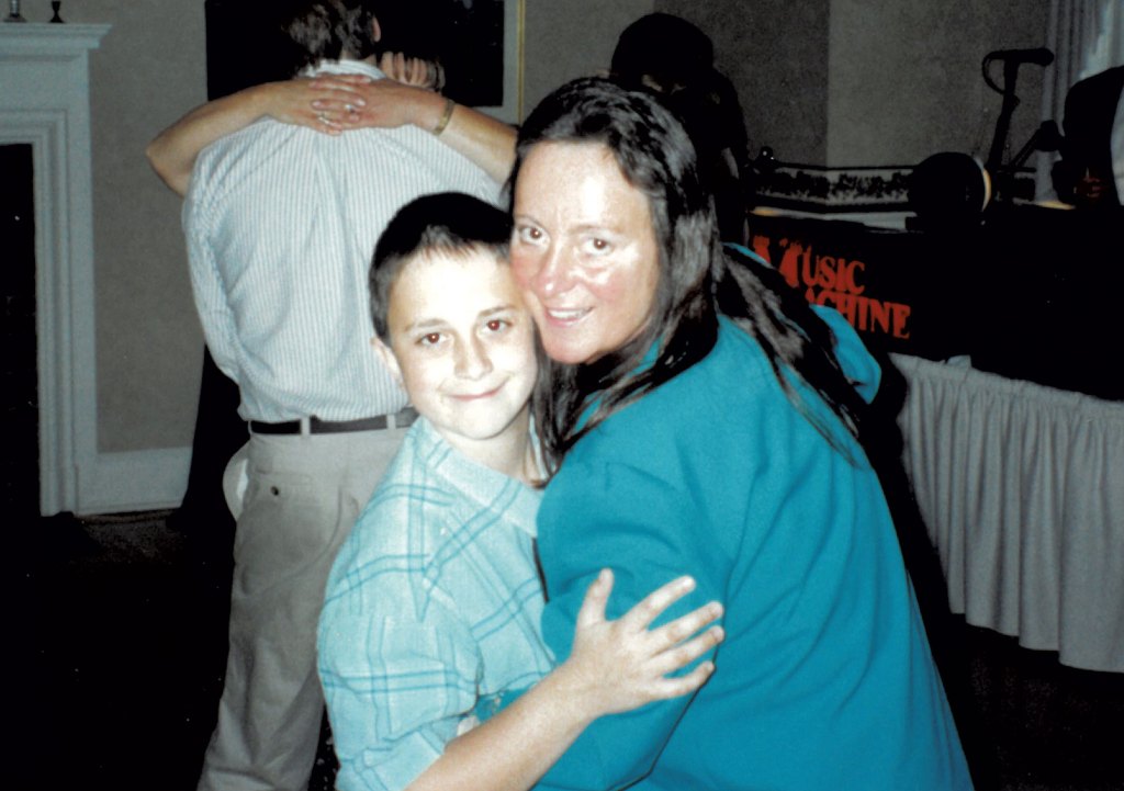 Aaron LaRoche dancing with his mother in 1996