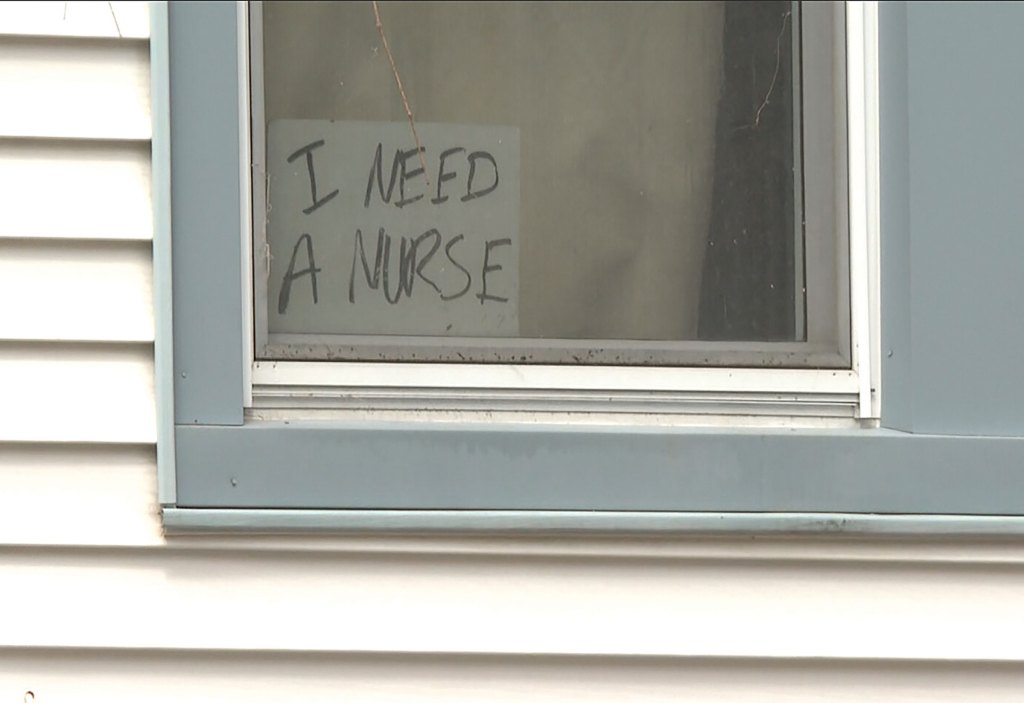 A sign in Aaron LaRoche's window