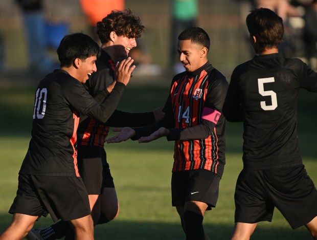 Beecher's Axel Juarez (10) celebrates his second goal of the game with Axel Avila (14) during the River Valley Conference Tournament against Grant Park Wednesday, Oct. 8, 2025 in Beecher, IL. (Steve Johnston/for the Daily Southtown)