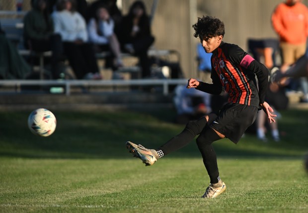 Beecher's Wences Baumgartner (12) converts on the free kick for a goal against Grant Park during the River Valley Conference Tournament Wednesday, Oct. 8, 2025 in Beecher, IL. (Steve Johnston/for the Daily Southtown)