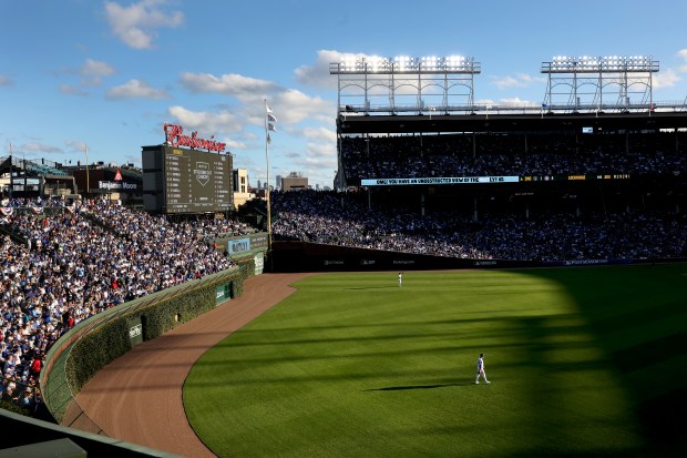Chicago Cubs center fielder Pete Crow-Armstrong gets set on defense...