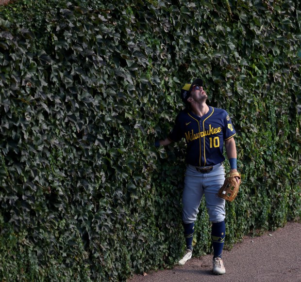 Milwaukee Brewers right fielder Sal Frelick (10) watches as a...