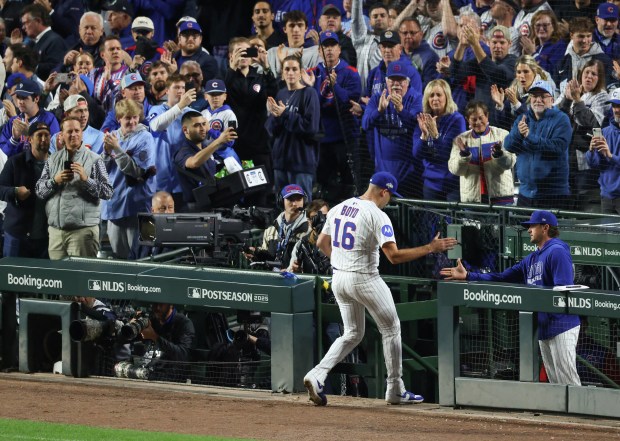 Cubs starting pitcher Matthew Boyd gets a standing ovation after...