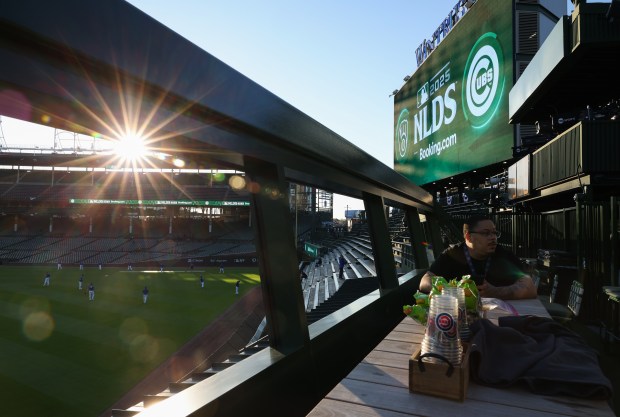 A concessions worker takes a break before Game 4 of...