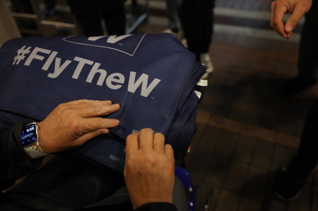 Rally towels are handed to entrants for Game 4 of...