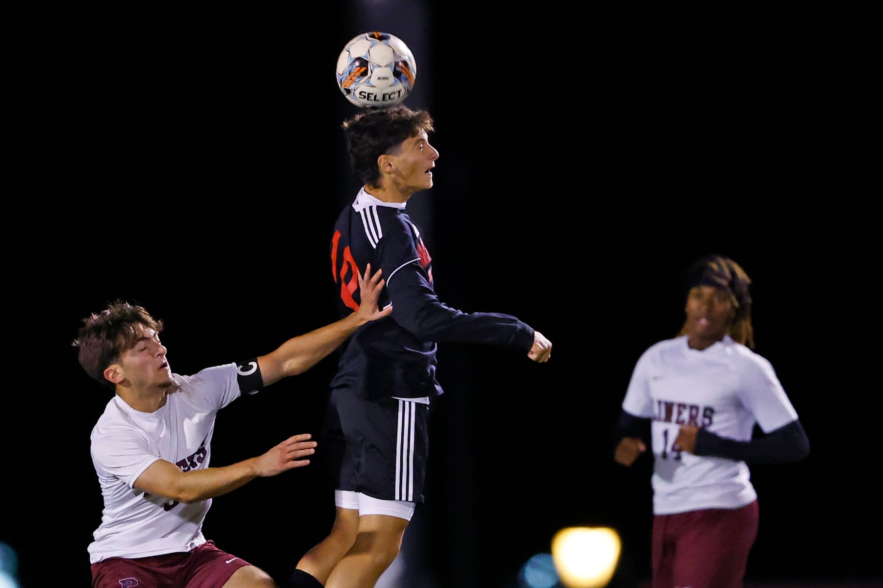 Easton's Marco Mannino (10) heads the ball away from Phillipsburg's Joseph Firetto (3) during a boy’s soccer match in Easton on Oct. 13 2025.